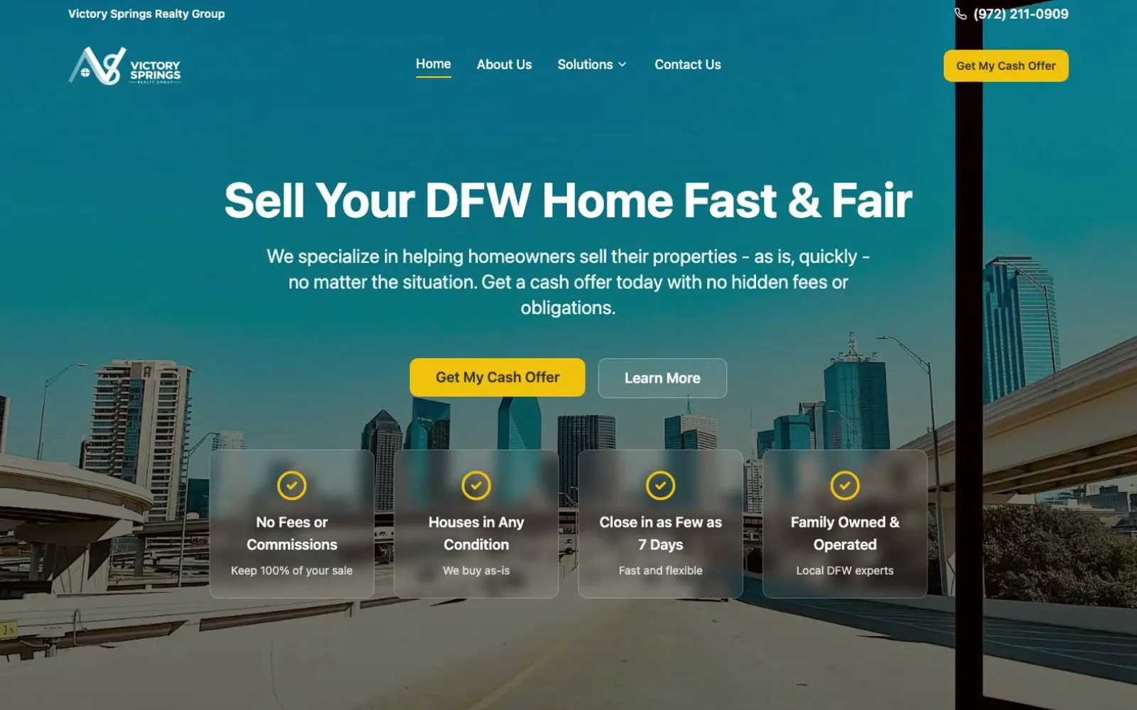 The Victory Springs Realty Group homepage: glass cards over a drive into Dallas.